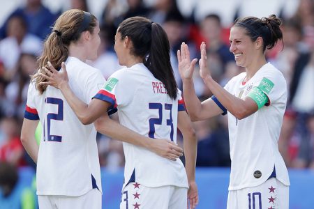 PARIS, FRANCE - JUNE 16: Carli Lloyd of USA Women Celebrates with Tierna Davidson of USA Women, Christen Press of USA Women during the World Cup Women match between USA v Chile at the Parc des Princes on June 16, 2019 in Paris France (Photo by Eric Verhoeven/Soccrates/Getty Images)
