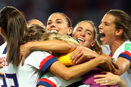 PARIS, FRANCE - JUNE 28: Christen Press, Alex Morgan, Morgan Brian, and Tobin Heath celebrate after the 2019 FIFA Women's World Cup France Quarter Final match between France and USA at Parc des Princes on June 28, 2019 in Paris, France. (Photo by Maddie Meyer - FIFA/FIFA via Getty Images)
