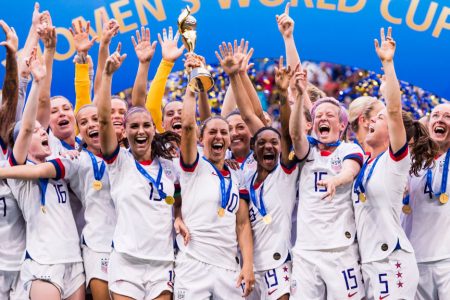 LYON, FRANCE - JULY 07: USA players celebrating with the winners trophy during the 2019 FIFA Women's World Cup France Final match between The United State of America and The Netherlands at Stade de Lyon on July 7, 2019 in Lyon, France. (Photo by Marcio Machado/Getty Images)