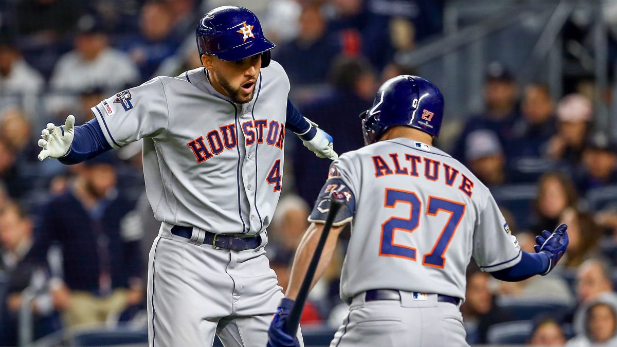 NEW YORK, NEW YORK - OCTOBER 17: George Springer #4 of the Houston Astros is congratulated by his teammate Jose Altuve #27 after hitting a three-run home run against the New York Yankees during the third inning in game four of the American League Championship Series at Yankee Stadium on October 17, 2019 in New York City. (Photo by Mike Stobe/Getty Images)