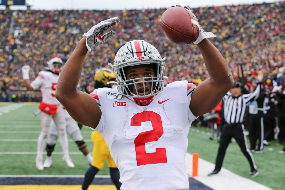 ANN ARBOR, MI - NOVEMBER 30: Ohio State Buckeyes running back J.K. Dobbins (2) celebrates in the end zone after scoring a touchdown during a regular season Big 10 Conference game between the Ohio State Buckeyes (2) and the Michigan Wolverines (10) on November 30, 2019 at Michigan Stadium in Ann Arbor, Michigan. (Photo by Scott W. Grau/Icon Sportswire via Getty Images)