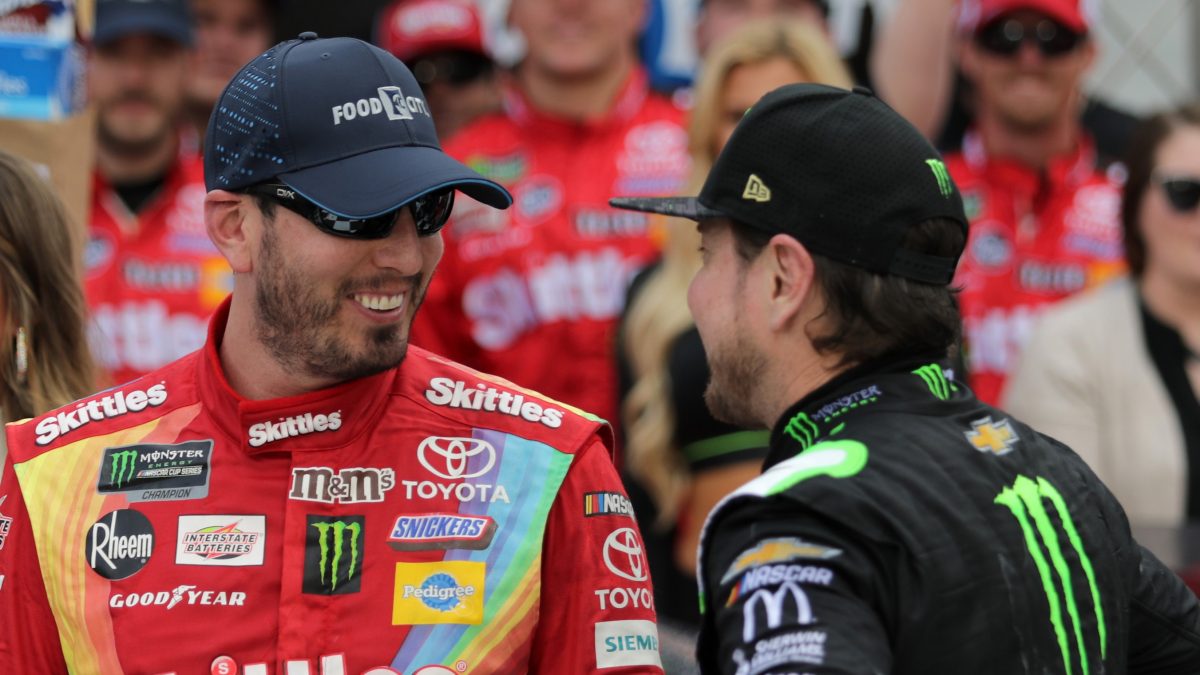 BRISTOL, TN - APRIL 07: Kurt Busch, driver of the #1 Monster Energy Chevrolet, congratulates Kyle Busch, driver of the #18 Skittles Toyota, in Victory Lane after winning the Monster Energy NASCAR Cup Series Food City 500 at Bristol Motor Speedway on April 7, 2019 in Bristol, Tennessee. (Photo by Donald Page/Getty Images)