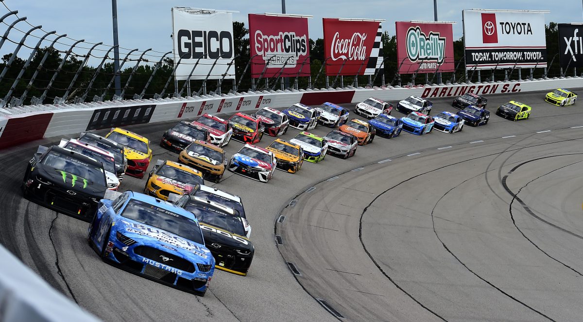 DARLINGTON, SOUTH CAROLINA - MAY 17: Kevin Harvick, driver of the #4 Busch Light #YOURFACEHERE Ford, races during the NASCAR Cup Series The Real Heroes 400 at Darlington Raceway on May 17, 2020 in Darlington, South Carolina. NASCAR resumes the season after the nationwide lockdown due to the ongoing coronavirus (COVID-19). (Photo by Jared C. Tilton/Getty Images)