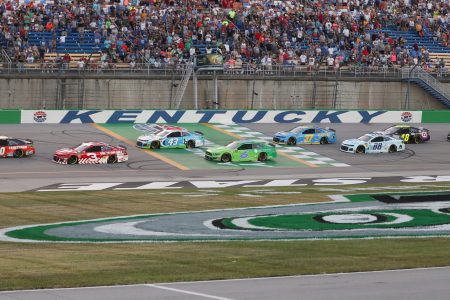 SPARTA, KY - JULY 13: Drivers race down the straightaway approach turn one during the Quaker State 400 presented by Walmart at Kentucky Speedway in Sparta, KY on July 13, 2019.(Photo by Ian Johnson/Icon Sportswire via Getty Images)