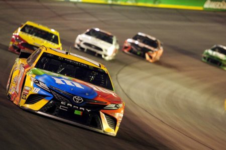 SPARTA, KY - JULY 13: Kyle Busch (18) Joe Gibbs Racing (JGR) Toyota Camry leads the field off of turn two during the Monster Energy NASCAR Cup Series Quaker State 400 presented by Walmart on July 13, 2019, at Kentucky Speedway in Sparta, Kentucky. (Photo by Michael Allio/Icon Sportswire via Getty Images)
