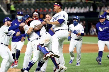 ARLINGTON, TX - OCTOBER 27: Members of the Los Angeles Dodgers celebrate on the field after defeating the Tampa Bay Rays in Game 6 to clinch the 2020 World Series at Globe Life Field on Tuesday, October 27, 2020 in Arlington, Texas. (Photo by Alex Trautwig/MLB Photos via Getty Images)