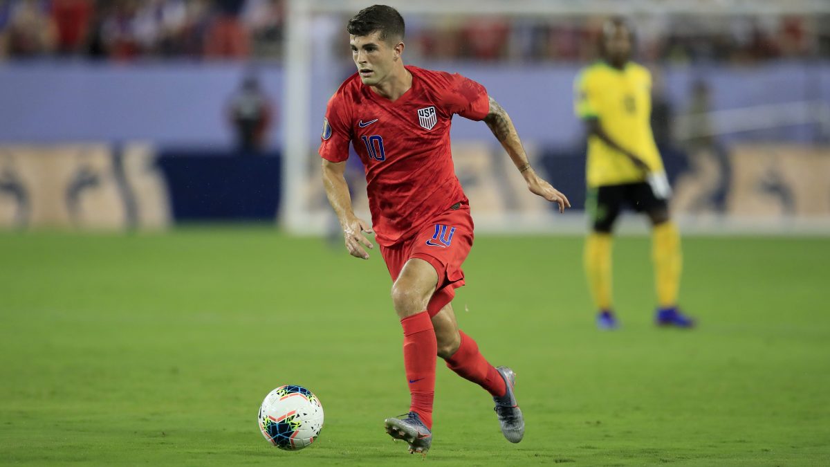 NASHVILLE, TENNESSEE - JULY 03: Christian Pulisic #10 of United States controls the ball against Jamaica in the semifinal game of the 2019 CONCACAF Gold Cup at Nissan Stadium on July 03, 2019 in Nashville, Tennessee. (Photo by Andy Lyons/Getty Images)