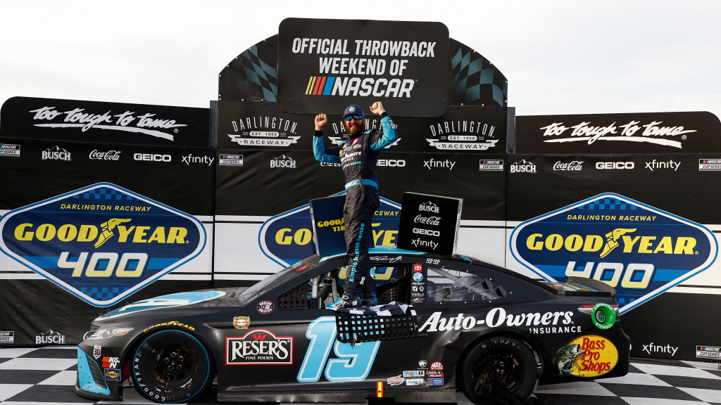DARLINGTON, SOUTH CAROLINA - MAY 09: Martin Truex Jr., driver of the #19 Auto-Owners Insurance Toyota, celebrates in victory lane after winning the NASCAR Cup Series Goodyear 400 at Darlington Raceway on May 09, 2021 in Darlington, South Carolina. (Photo by Chris Graythen/Getty Images)